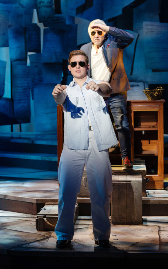 two men performing on stage