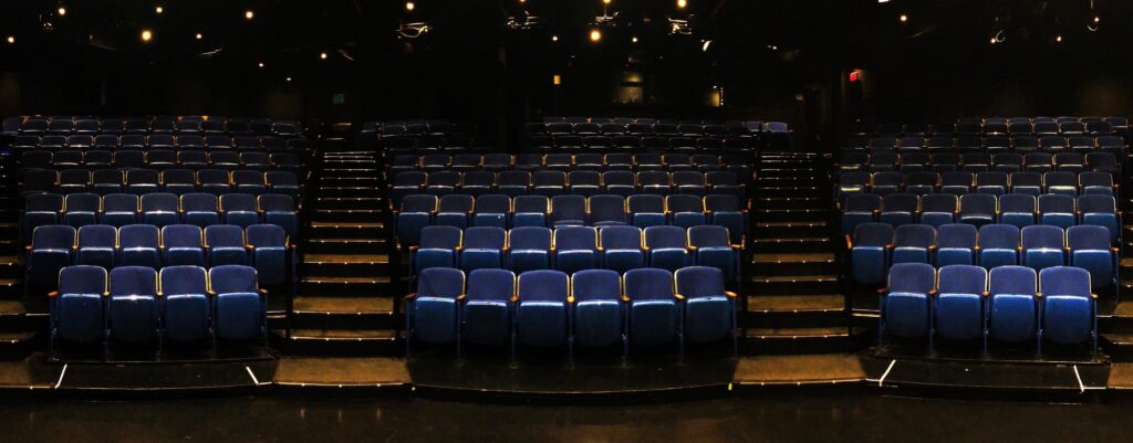 empty theater with blue seats