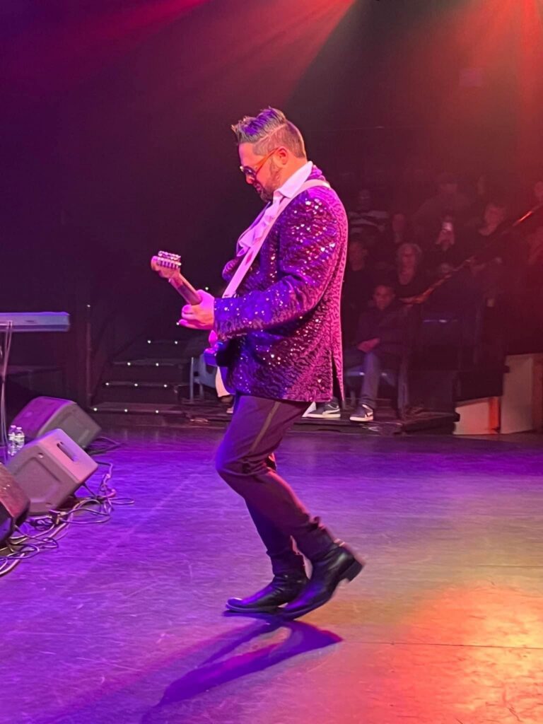 man playing guitar