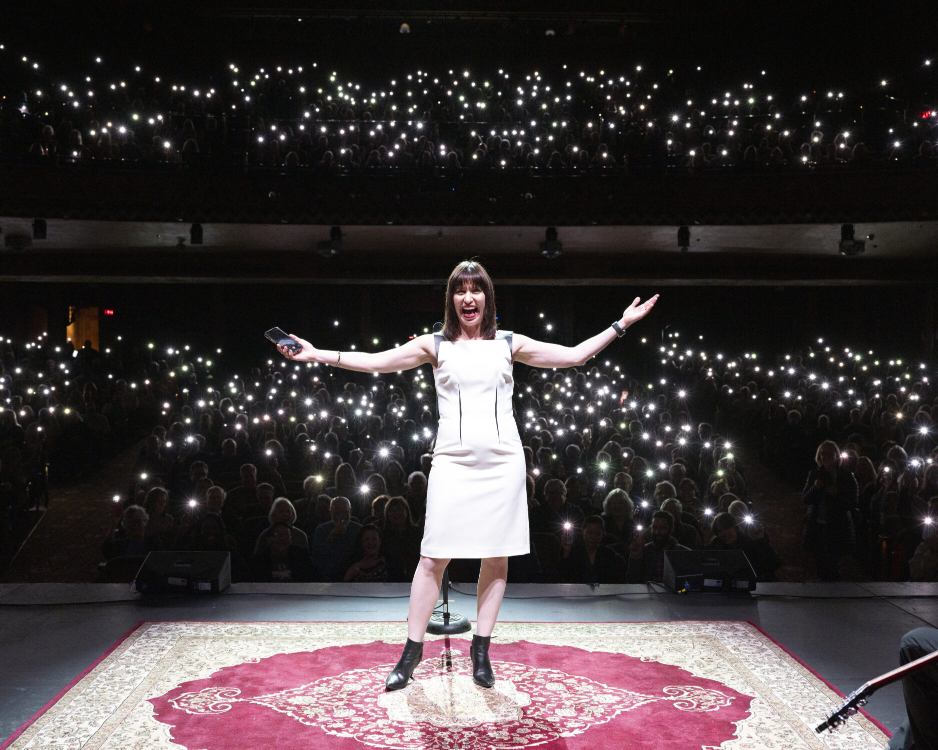ophira eisenberg on stage