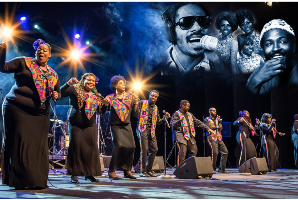 harlem gospel choir performing on stage