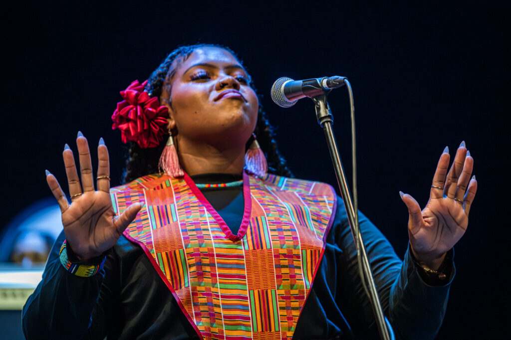 woman from a choir performing
